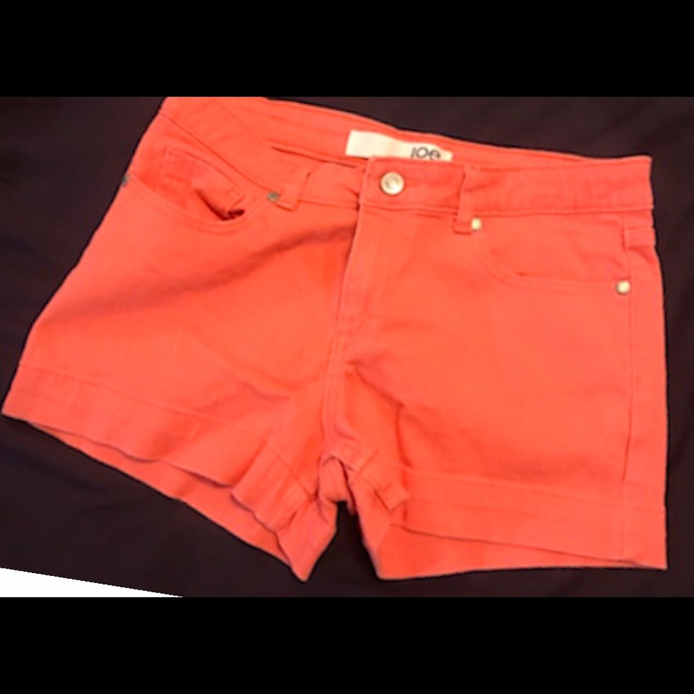 Used sized 4 orange colored shorts by Joe Fresh